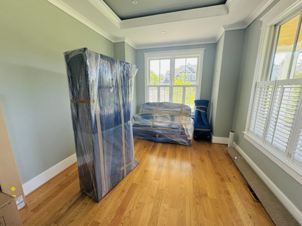 High-quality furniture wrapping and padding performed by Noah’s Relocation Services during a local move