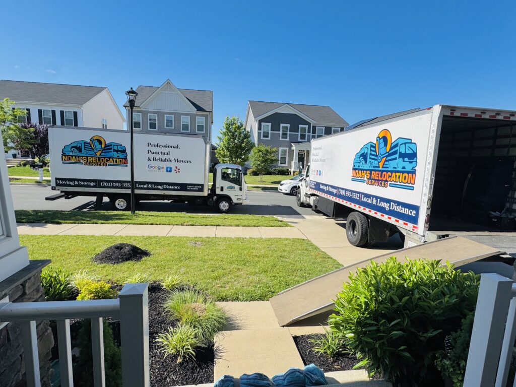 Two moving trucks parked in Fredericksburg VA during a large household relocation