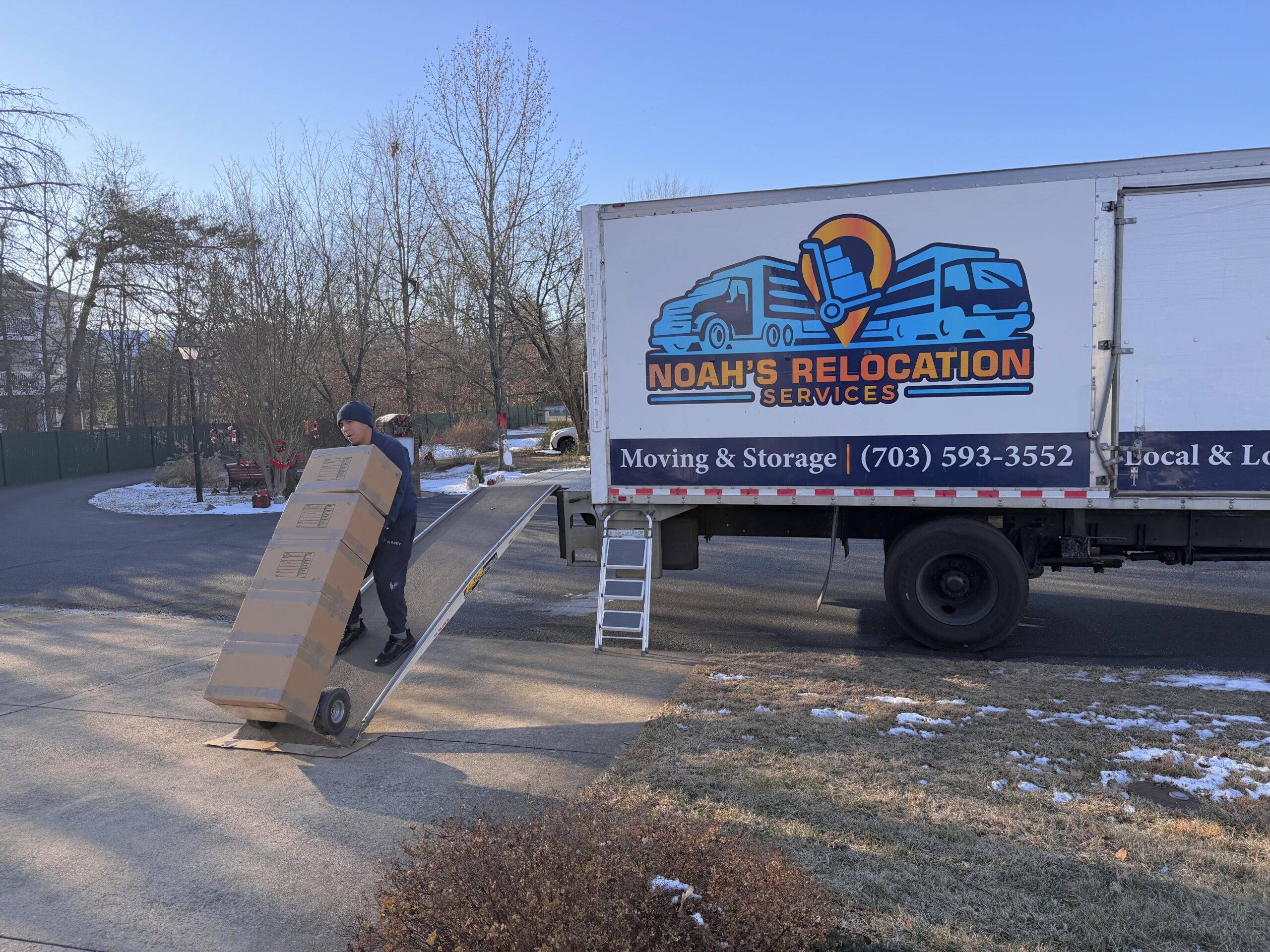 Professional local movers from Noah’s Relocation Services loading a moving truck for a residential move in Northern Virginia