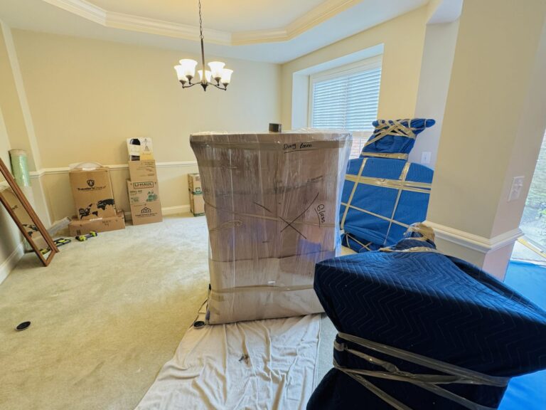 Licensed and insured movers protecting furniture during relocation in Northern Virginia
