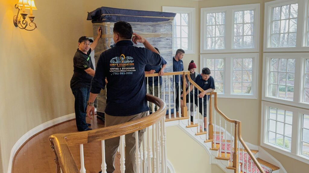 Licensed and insured movers carefully loading furniture in Northern Virginia
