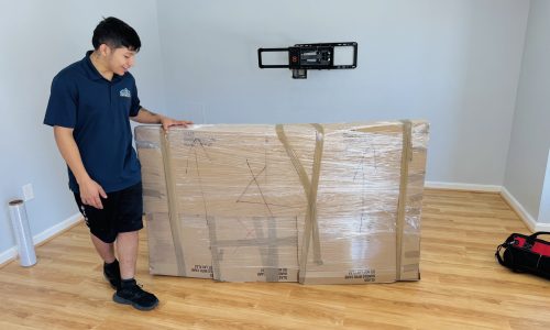 “Flat-screen TV fully wrapped and padded by professional movers in Northern Virginia”